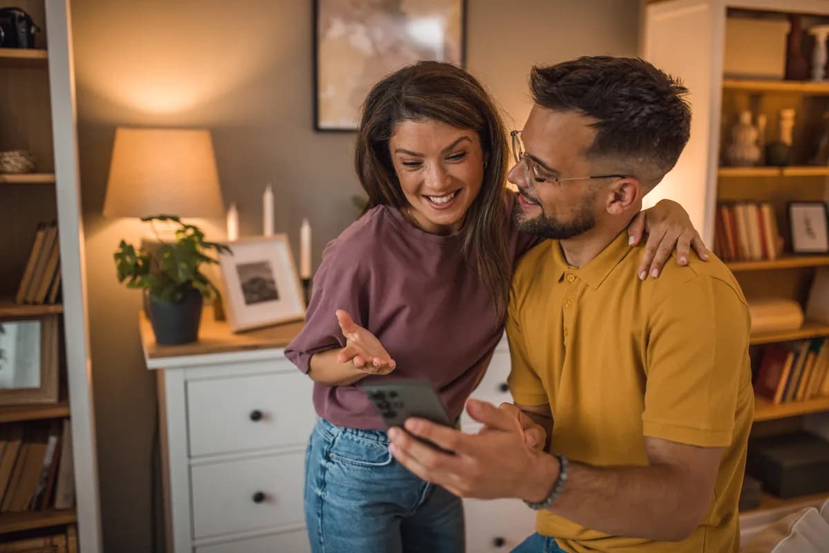 Couple looking at phone